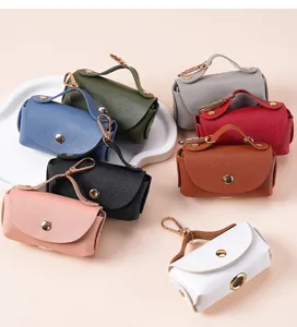 Tragbarer Mini-Hundebeutelspender aus Leder mit Metallhaken, bunte Haustier-Kotbeuteltasche.