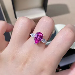 Exquise 925 zilveren ring met roze saffier en stenen, elegant dames sieradenontwerp.