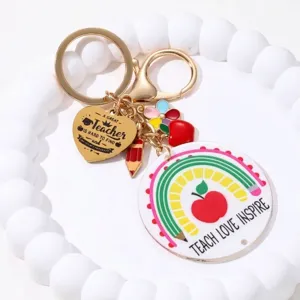 Sleutelhanger voor leraar met regenboog appelbedeltje en gegraveerd gouden hart