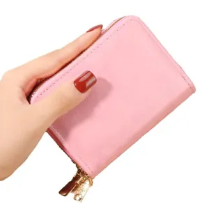 Porte-cartes rose minimaliste à double fermeture éclair pour un usage quotidien.