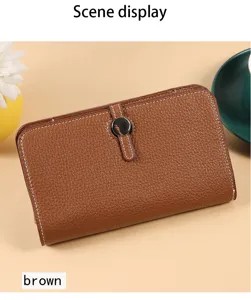 Billetera multifuncional marrón bolsa de teléfono de cuero con elegante cierre a presión.