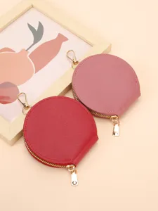 Women's portable mini round zipper coin purse and earphone key storage bag main view.