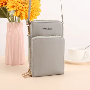 Grey crossbody phone bag with multi-layer zipper and slim strap, perfect for daily minimalist style.