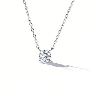 Classic four-prong single diamond pendant necklace, elegant minimalist silver clavicle chain.