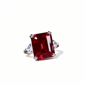 Stunning created ruby ring with emerald cut design in sterling silver, elegant fashion jewelry.
