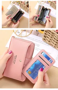 Détail de long portefeuille femme rose avec fentes pour cartes et étui amovible.