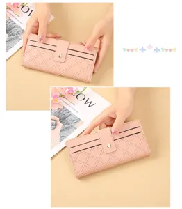 Pink quilted long wallet detail view, PU leather purse with snap button and card slots.