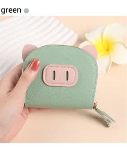 Porte-monnaie cochon vert mignon pour femme, petit portefeuille en cuir PU avec fermeture.