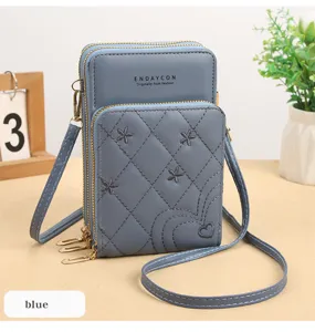 Borsa a tracolla blu per cellulare con cerniere multiple e delicati ricami floreali.