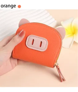 Porte-monnaie cochon de dessin animé orange mignon avec emplacements pour cartes.