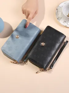 Portefeuille long femme double fermeture éclair pochette élégante avec motif floral en relief.