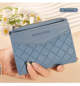 Detailed view of women short wallet with cute heart quilted pattern and secure zipper coin pocket.