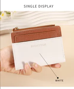 Detail view of the two-tone short card wallet featuring brown and white contrast design.