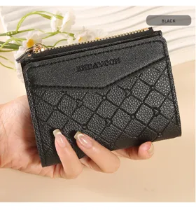 Women's short black PU leather zipper wallet with classic plaid embossing and gold hardware.