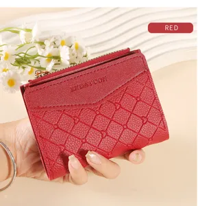 Close-up of a red short women wallet featuring chic lattice embossing and convenient zipper.