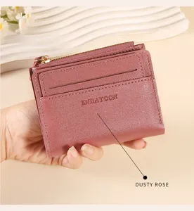 Compact women's short wallet with card slots and zipper pocket, elegant dusty rose color design.