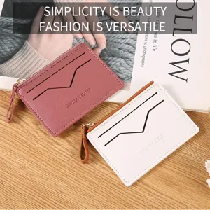 Detailed view of minimal PU leather card holder zipper wallet with multi slots in pink and white.