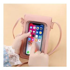 Pink touchscreen crossbody phone bag for women, PU leather mini shoulder purse with clear window.