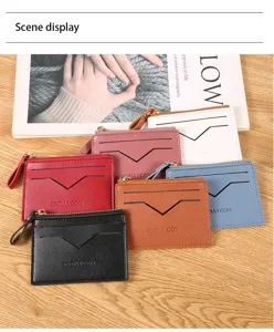 Scene detail of colorful women zipper card wallets with multiple slots in a stylish display.