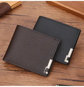 Men's short leather wallet detail view showing smooth texture and metal corner decor.