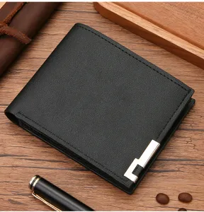 Men's black short leather wallet with card slots and metal corner decoration for daily use.