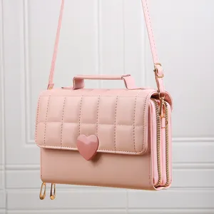 Roze gewatteerde telefoon crossbody tas detail, stijlvolle PU lederen tas met hart.