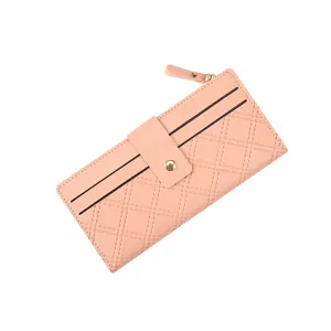 Pink long quilted wallet for women with card slots snap closure and zipper pocket main view