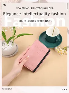 Pink PU leather passport holder with elastic band, travel wallet case for cards and ID.