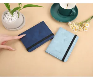 PU leather RFID passport wallet holder with elastic band, travel document organizer bag.