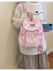 Sac à dos décontracté rose motif étoiles pour femmes, cartable coréen mignon avec poches multiples.