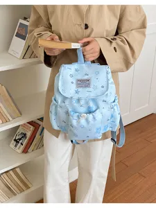 Joli sac à dos bleu clair imprimé étoiles style coréen mignon pour femme voyage quotidien.