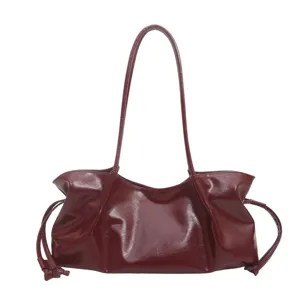 Chic shiny leather vintage shoulder bag for women, trendy large capacity baguette tote purse.
