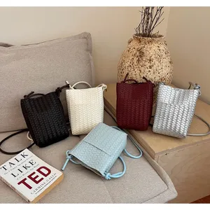 Woven PU leather crossbody phone bag in multiple chic colors, trendy daily shoulder bag.