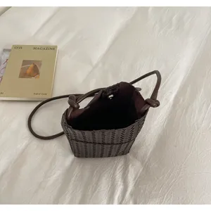 Dark brown woven PU phone bag for women, stylish Korean style crossbody bag with shoulder strap.