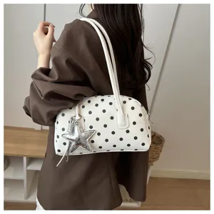 White polka dot shoulder bag for women cute underarm pillow bag with silver star charm.