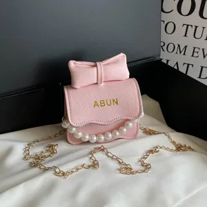 Petit sac à bandoulière rose avec nœud et chaîne de perles mode femme automne neuf