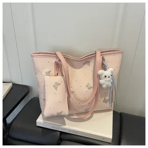 Pink tote bag for women with glitter butterfly print, chic shoulder bag with matching pouch.