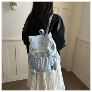 Sac à dos mignon imprimé d'étoiles avec cordon pour fille détail de cartable chic.