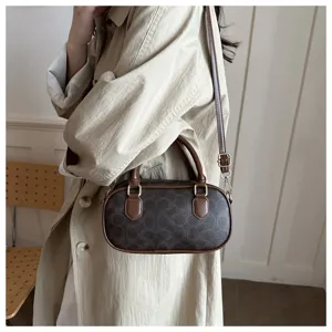 Classic monogram shoulder bag detail, elegant brown trim and premium hardware design for daily use.