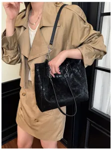 Stylish black large capacity tote bag with trendy numeric print, versatile shoulder bag for women daily use.