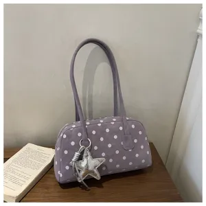 Purple polka dot shoulder bag for women, cute Korean style underarm pillow bag with star charm.