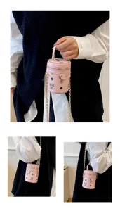 New mini cute pink bucket bag with gold chain, stylish children's accessory crossbody handbag.