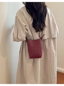 Woven PU leather crossbody phone bag for women, stylish Korean style shoulder bag for autumn.