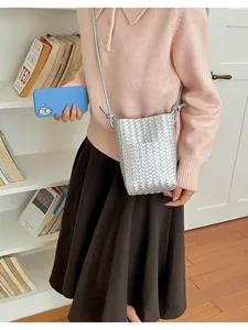 Korean style silver woven crossbody bag for women, PU leather phone shoulder bag casual chic.
