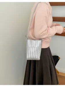 Trendy silver woven crossbody bag for women, stylish PU leather phone pouch with thin strap.