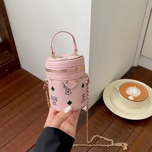 Cute pink cylinder bucket bag with chain strap and bear print, mini fashion crossbody bag for girls.