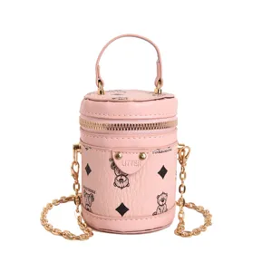Cute pink mini bucket bag for kids, stylish crossbody purse with gold chain handle.