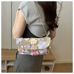 Floral embroidered shoulder bag with chain strap, stylish summer crossbody purse for women.