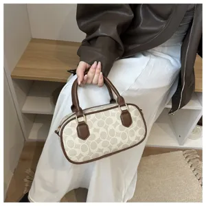 Retro monogram handbag pillow bag, stylish shoulder crossbody bowling bag for women.