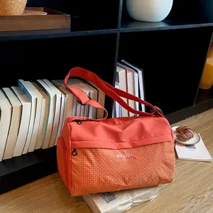 Orange travel duffel bag large capacity gym bag waterproof weekend overnight bag for women
